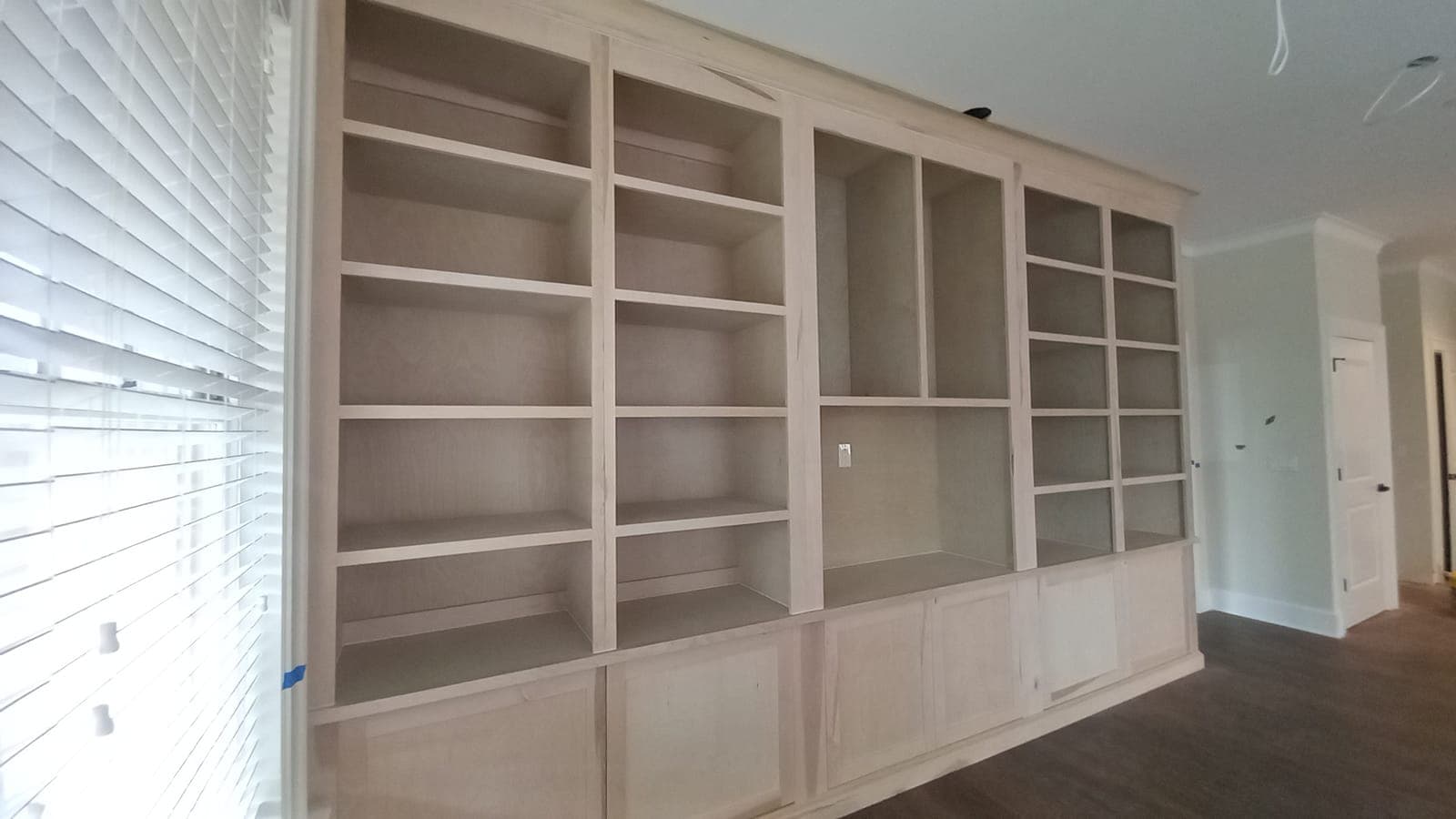 Large custom built-in bookcase in the build stage before finishing, by Hdez Gabinets
